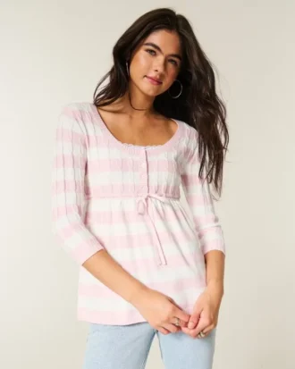 Babydoll-genser med kabelstrikk