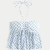 Babydoll-top med halterneck og lag