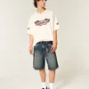 Baggy denimshorts med slangegrafikk