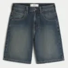 Baggy denimshorts med slangegrafikk