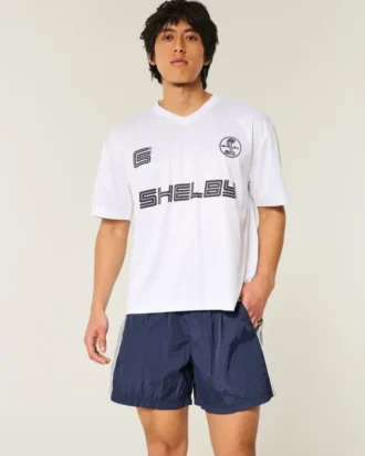 Baggy fotballshorts til midt på låret