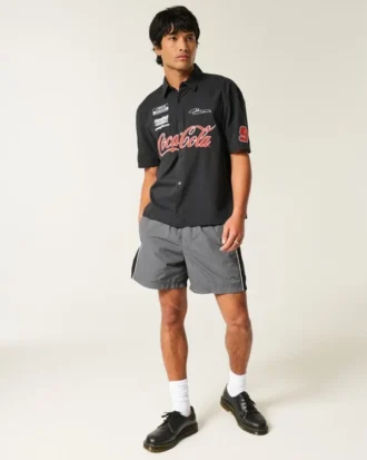 Baggy fotballshorts til midt på låret