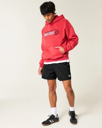 Baggy fotballshorts til midt på låret