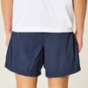 Baggy fotballshorts til midt på låret