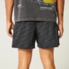 Baggy fotballshorts til midt på låret