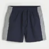 Baggy fotballshorts til midt på låret