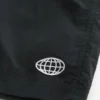 Baggy fotballshorts til midt på låret