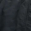 Baggy fotballshorts til midt på låret