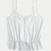 Blonderdetaljer Peplum-top
