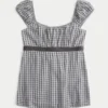 Enkel babydoll-top med satengbånd