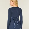 Enkel langermet babydoll-top med krysset front