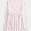 Enkel langermet babydoll-top med krysset front