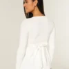 Enkel langermet babydoll-top med krysset front