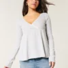 Enkel langermet babydoll-top med pointelle