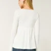 Enkel langermet babydoll-top med pointelle