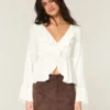 Enkel langermet babydoll-top med volanger