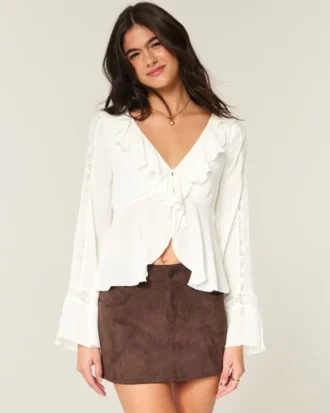 Enkel langermet babydoll-top med volanger