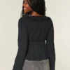 Enkel langermet babydoll-top med volanger