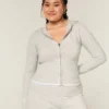 Gilly Hicks Zip-Up Hoodie Sweater med bølget kant