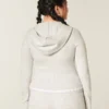 Gilly Hicks Zip-Up Hoodie Sweater med bølget kant