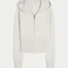 Gilly Hicks Zip-Up Hoodie Sweater med bølget kant
