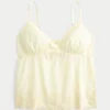 Glitrende brodert babydoll-top