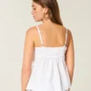 Glitrende brodert babydoll-top