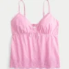Glitrende brodert babydoll-top