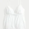 Glitrende brodert babydoll-top