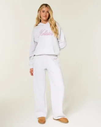 Glitrende logo-grafikk Sweatpants med vide ben