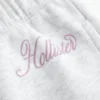 Glitrende logo-grafikk Sweatpants med vide ben