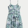 Glitrende smocked minikjole