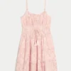 Glitrende smocked minikjole