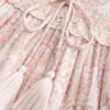 Glitrende smocked minikjole