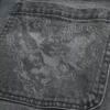 Grå baggy jeans med hjertegrafikk