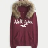 Hettegenser med glidelås, logo og fuskepels