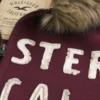 Hettegenser med glidelås, logo og fuskepels