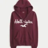 Hettegenser med glidelås, logo og fuskepels