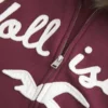 Hettegenser med glidelås, logo og fuskepels