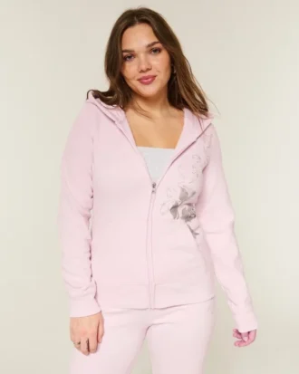 Hettegenser med glidelås og rose-motiv