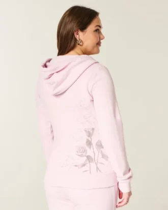 Hettegenser med glidelås og rose-motiv