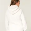Holiday Vault Release Sherpa-fôret hettegenser med glidelås og logo