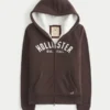 Holiday Vault Release Sherpa-fôret hettegenser med glidelås og logo