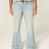 Høy midje, lys vask, stjerneformet lomme, flare-jeans