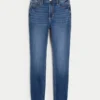 Høy midje, mørkvasket super skinny jeans
