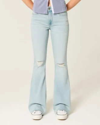Høy midje, revne, lysevaskede flare-jeans