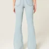 Høy midje, revne, lysevaskede flare-jeans