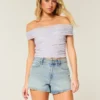 Høy midje, slitt, lysvasket A-linje denimshorts