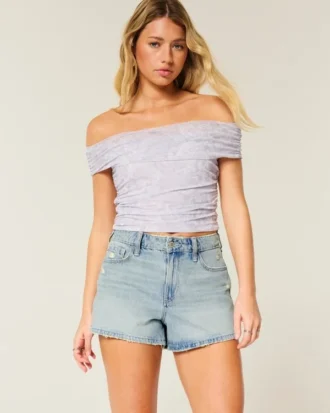 Høy midje, slitt, lysvasket A-linje denimshorts