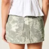 Kurvet lav midje Camo Denim Mini Skort
